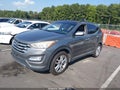 2015 Hyundai Santa Fe — photo 2 of 16 | VIN 5XYZW4LA8FG266175