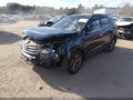 2016 Hyundai Santa Fe — photo 2 of 17 | VIN 5XYZUDLB6GG380577