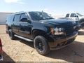 2011 Chevrolet Suburban 1500 — photo 13 of 16 | VIN 1GNSKHE3XBR149073