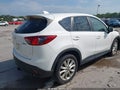 2014 Mazda CX-5 — photo 4 of 16 | VIN JM3KE4DY4E0385868