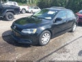 2014 Volkswagen Jetta — photo 2 of 11 | VIN 3VW2K7AJ3EM328419