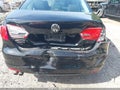 2014 Volkswagen Jetta — photo 6 of 11 | VIN 3VW2K7AJ3EM328419