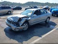 2004 Kia Optima — photo 2 of 16 | VIN KNAGD128945263783