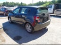 2014 Chevrolet Sonic — photo 3 of 15 | VIN 1G1JC6SH4E4118885