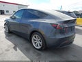 2023 Tesla Model Y — photo 3 of 18 | VIN 7SAYGAEE7PF926208