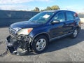 2009 Honda CR-V — photo 2 of 17 | VIN 5J6RE383X9L024921