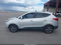 2014 Hyundai Tucson — photo 14 of 16 | VIN KM8JU3AG5EU930526