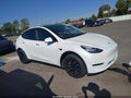 2022 Tesla Model Y — photo 13 of 18 | VIN 7SAYGDEE3NF386421