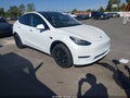 2022 Tesla Model Y — photo 1 of 18 | VIN 7SAYGDEE3NF386421