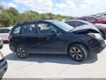 2018 Subaru Forester — photo 13 of 19 | VIN JF2SJABC0JH443739
