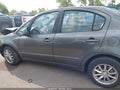 2011 Suzuki SX4 — photo 14 of 16 | VIN JS2YC5A29B6300746