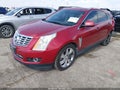 2016 Cadillac SRX — photo 2 of 18 | VIN 3GYFNCE31GS526652