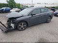 2020 Subaru Impreza — photo 2 of 15 | VIN 4S3GKAD60L3613803