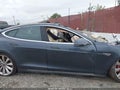 2014 Tesla Model S — photo 11 of 14 | VIN 5YJSA1H10EFP44876