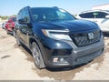 2019 Honda Passport — photo 1 of 16 | VIN 5FNYF7H90KB008682