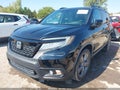 2019 Honda Passport — photo 2 of 16 | VIN 5FNYF7H90KB008682