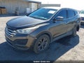 2014 Hyundai Santa Fe — photo 2 of 12 | VIN 5XYZT3LB9EG203211