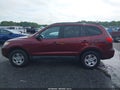 2009 Hyundai Santa Fe — photo 14 of 16 | VIN 5NMSG13D89H274603