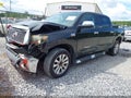 2012 Toyota Tundra — photo 2 of 16 | VIN 5TFFY5F12CX121639