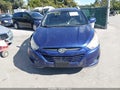 2011 Hyundai Tucson — photo 12 of 21 | VIN KM8JUCAC6BU227140