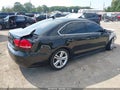 2014 Volkswagen Passat — photo 4 of 11 | VIN 1VWBS7A3XEC078616