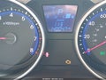 2013 Hyundai Tucson — photo 15 of 16 | VIN KM8JU3AC4DU669305