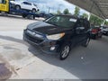 2013 Hyundai Tucson — photo 2 of 16 | VIN KM8JU3AC4DU669305