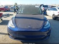 2023 Tesla Model Y — photo 13 of 19 | VIN 7SAYGDEE6PA092673