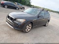 2013 BMW X1 — photo 2 of 11 | VIN WBAVM1C54DVW41942
