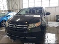 2016 Honda Odyssey — photo 11 of 15 | VIN 5FNRL5H68GB067798