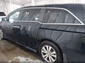 2016 Honda Odyssey — photo 13 of 15 | VIN 5FNRL5H68GB067798