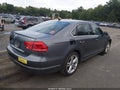 2014 Volkswagen Passat — photo 4 of 16 | VIN 1VWCT7A30EC042368
