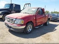 2002 Ford F-150 — photo 2 of 12 | VIN 1FTRF17222NB97276