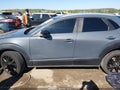 2023 Mazda CX-30 — photo 14 of 16 | VIN 3MVDMBCM6PM531919