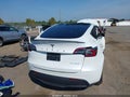 2023 Tesla Model Y — photo 16 of 16 | VIN 7SAYGDEE6PA127888
