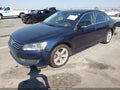 2013 Volkswagen Passat — photo 2 of 11 | VIN 1VWBP7A34DC098229