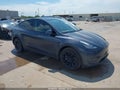 2023 Tesla Model Y — photo 1 of 18 | VIN 7SAYGDEE4PA044539