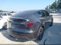 2024 Tesla Model Y — photo 4 of 14 | VIN 7SAYGDEE6RA333778