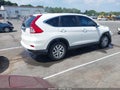 2015 Honda CR-V — photo 4 of 17 | VIN 5J6RM3H54FL000954