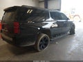 2018 Chevrolet Suburban — photo 4 of 16 | VIN 1GNSKHKC1JR151796