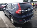 2015 Honda CR-V — photo 3 of 16 | VIN 5J6RM4H56FL057338