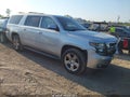 2016 Chevrolet Suburban — photo 1 of 16 | VIN 1GNSKHKC0GR102078
