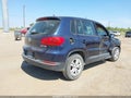 2014 Volkswagen Tiguan — photo 4 of 16 | VIN WVGAV3AX7EW501969