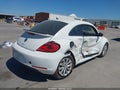 2016 Volkswagen Beetle — photo 4 of 20 | VIN 3VWF17AT3GM627823