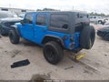 2011 Jeep Wrangler Unlimited — photo 3 of 16 | VIN 1J4BA3H10BL580740
