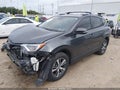 2018 Toyota RAV4 — photo 2 of 16 | VIN JTMWFREV9JJ723567