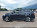 2018 Hyundai Santa Fe — photo 14 of 16 | VIN KM8SNDHF5JU273385