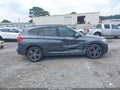 2018 BMW X1 — photo 13 of 16 | VIN WBXHU7C36J5H38904