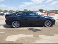 2016 Acura TLX — photo 13 of 16 | VIN 19UUB3F7XGA003687
