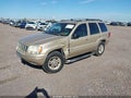 1999 Jeep Grand Cherokee — photo 2 of 16 | VIN 1J4GW68S5XC748140